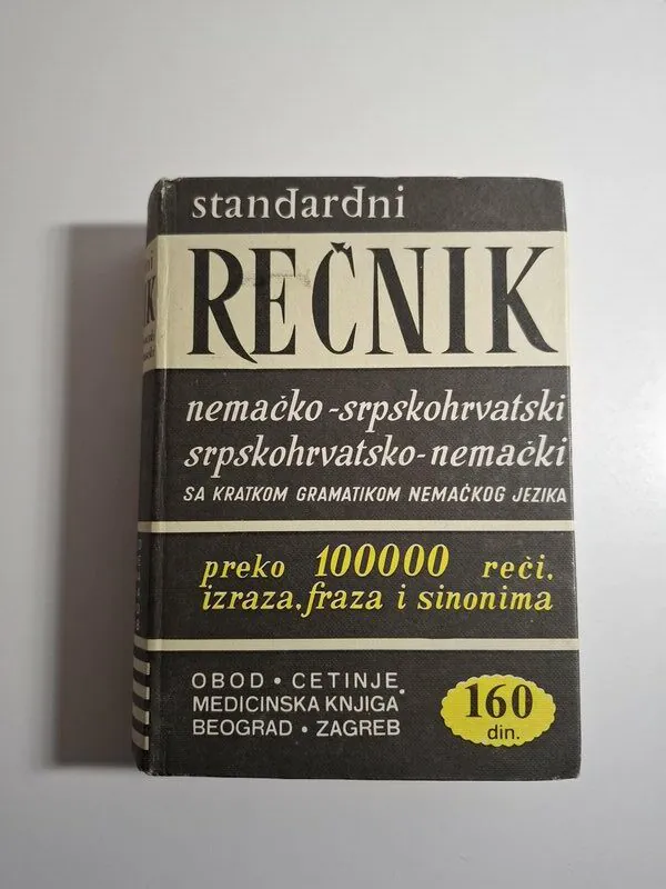Standardni rečnik nemačko-srpskohrvatski i srpskohrvatsko-nemački sa kratkom gramatikom njemačkog jezika , Branislav Grujić